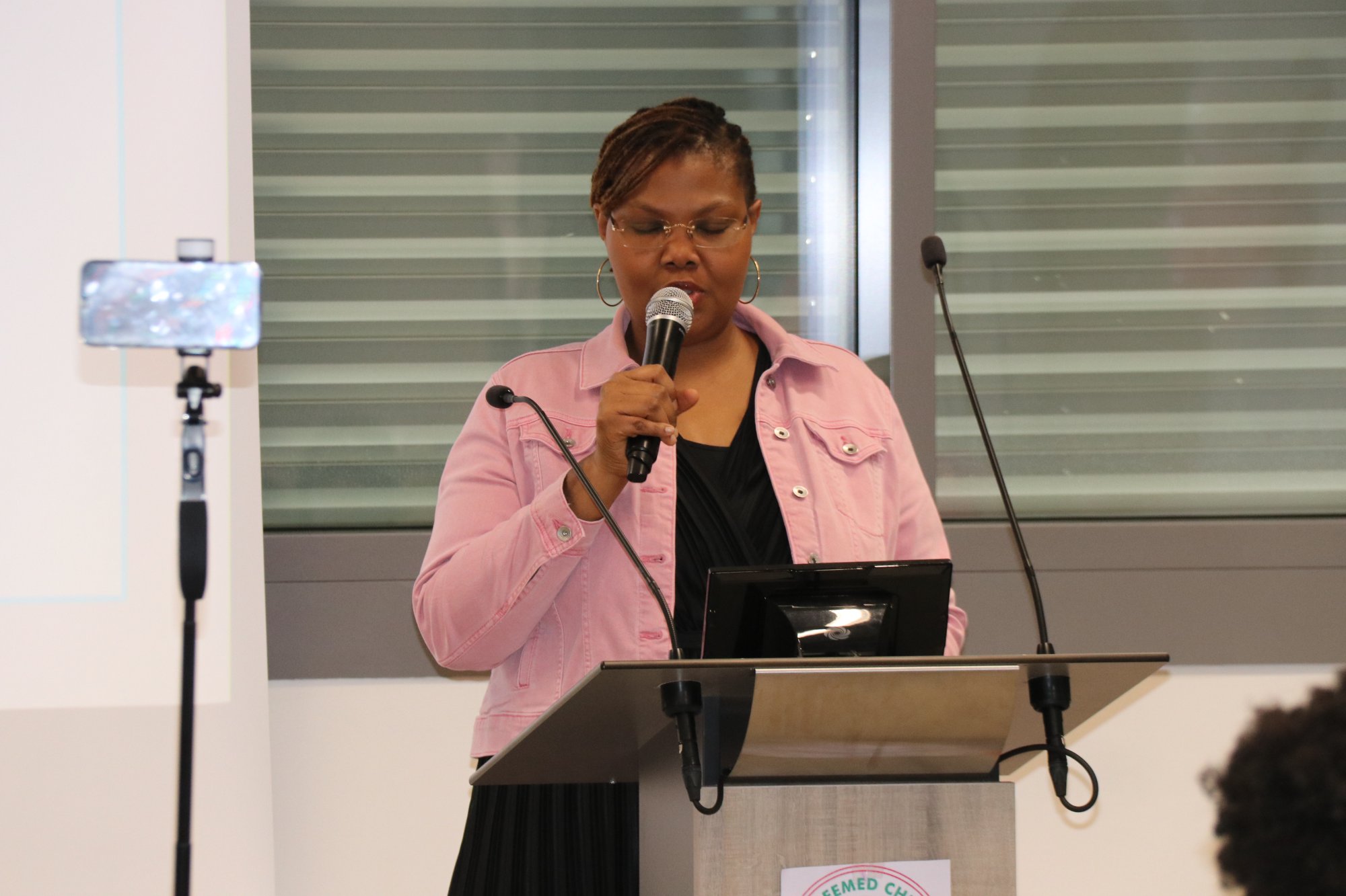 At the podium